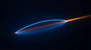 cash-burn-rate-hero - SaasCEO.com - SaasCEO.com Blue curved light beam arcs across a dark background, meeting an orange particle trail with sparks at the tip.
