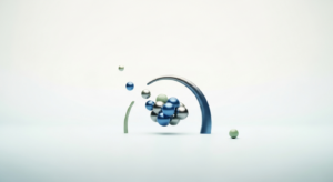 Abstract sculpture of blue and silver spheres with green arches, implying motion and balance.